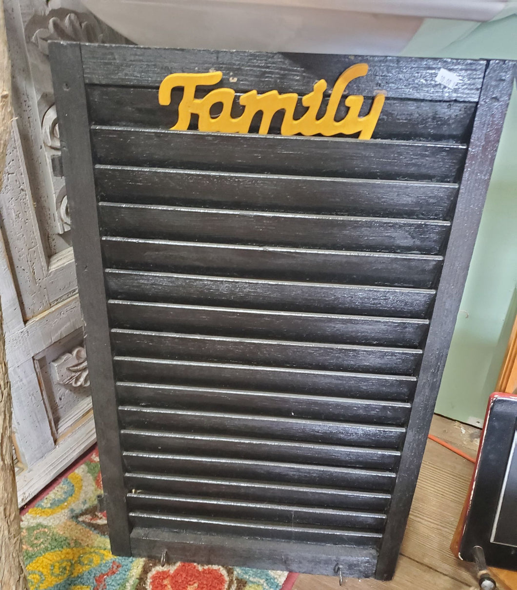 Black wooden shutter wall hanging note board  with a wooden insert saying 